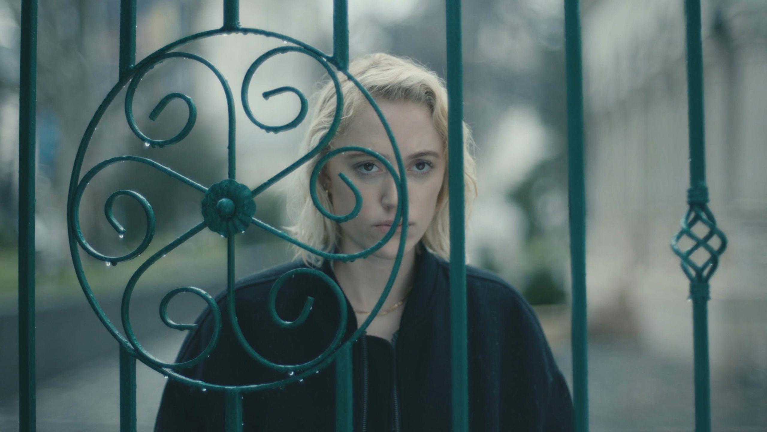 Maika Monroe appears in <i>Watcher</i> directed by Chloe Okuno.