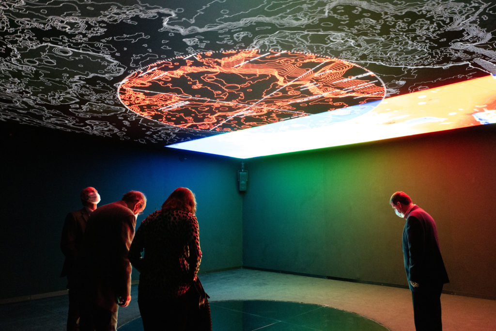 Guests beginning their trip at the party for 'The Infinite' VR flight aboard the International Space Station.