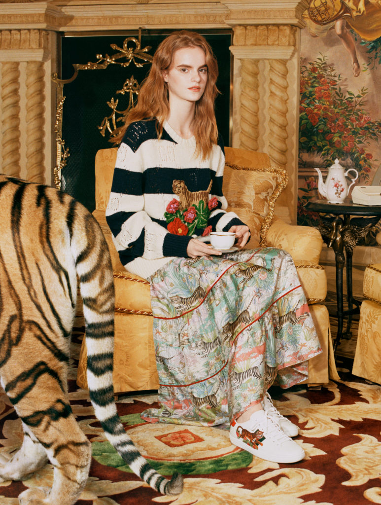 Gucci salutes the Year of the Tiger with a complete ready-to-wear and accessories collection embellished with the tiger image or 'Gucci Tiger' labeling.
