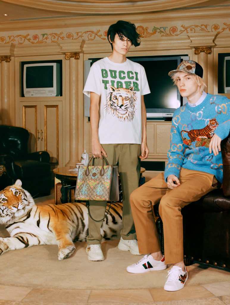 Gucci salutes the Year of the Tiger with a complete ready-to-wear and accessories collection embellished with the tiger image or 'Gucci Tiger' labeling.