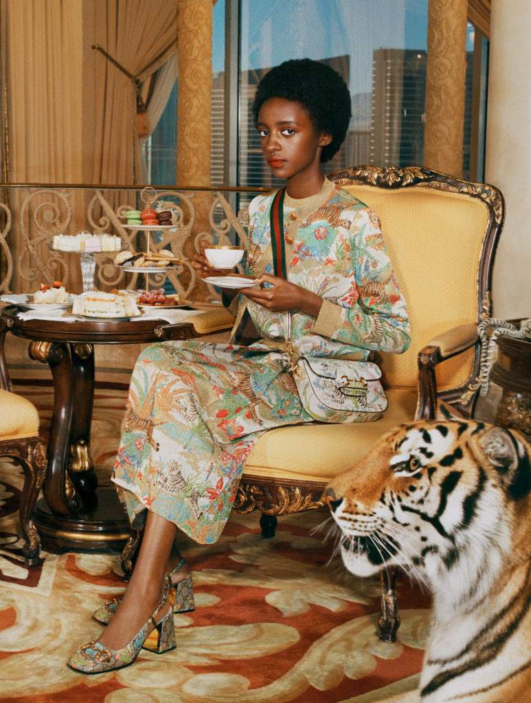 Gucci salutes the Year of the Tiger with a complete ready-to-wear and accessories collection embellished with the tiger image or 'Gucci Tiger' labeling.