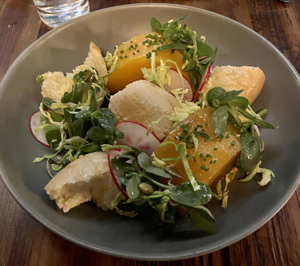 Cry Wolf's roasted butternut squash panzanella is also a great starter to share with a friend or date. (Photo by Megan Ziots)