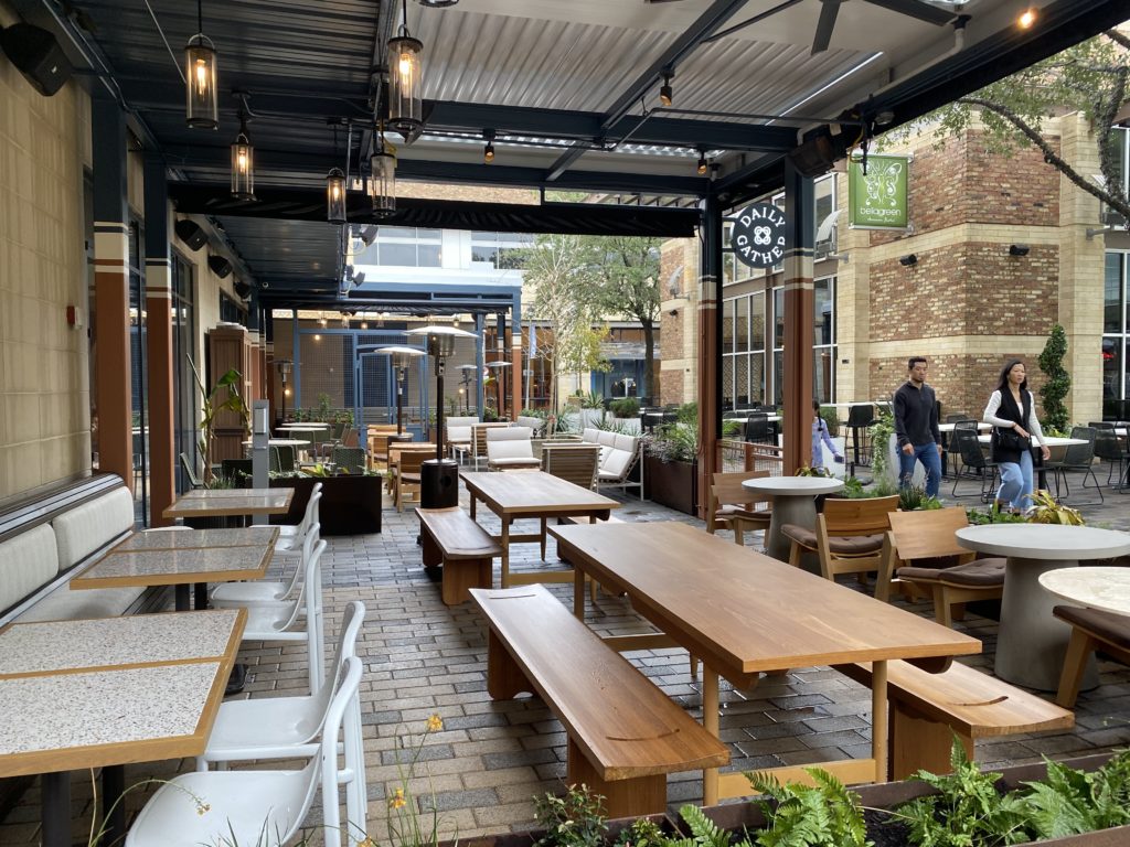 The outdoor patio at Daily Gather overlooks the CityCentre green. 