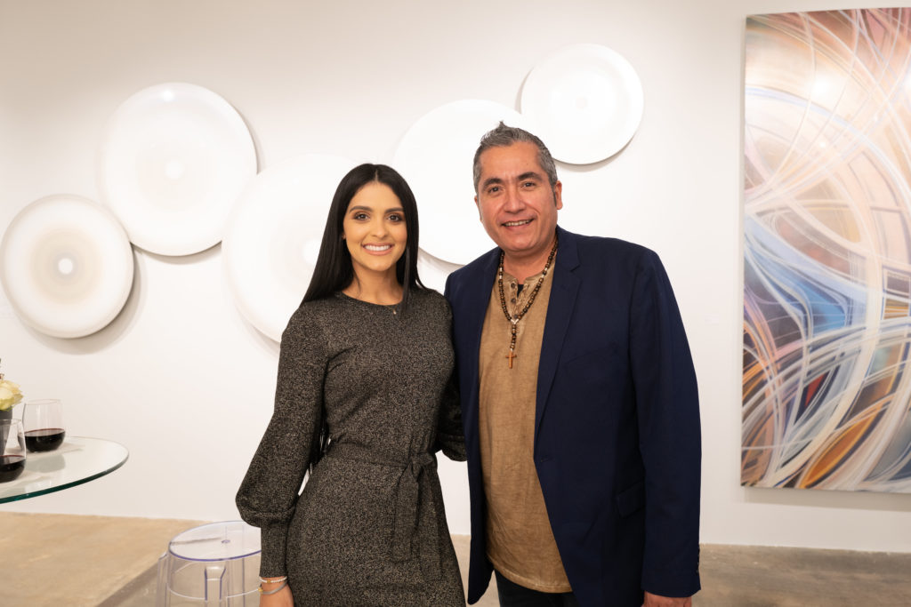 Janirys Roman, Jorge Olivares at the opening of artist Christopher Martin's gallery in the Upper Kirby District's Gallery Row in Houston. (Photo by Daniel Ortiz)