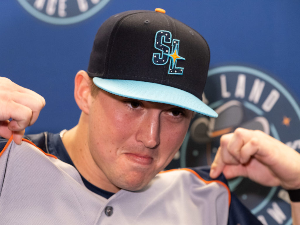 Houston Astros catching prospect Korey Lee showed off one of the Space Cowboys' new hats. (Photo by F. Carter Smith)