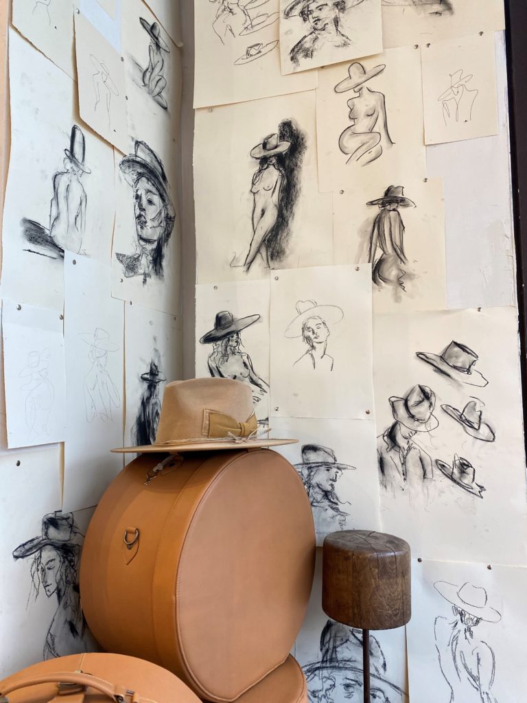 Sketches by Teressa Foglia creative director Tyler Hays Wild in the new boutique in Houston's River Oaks District. (Photo courtesy of Teressa Foglia)