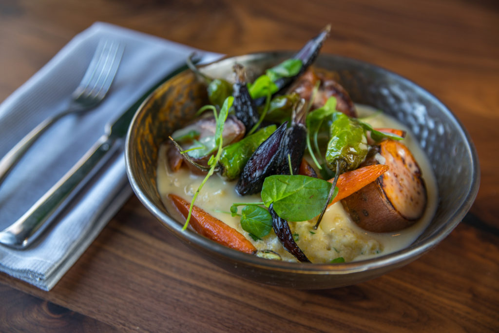 Vegetarians feast on homestead gristmill polenta topped with roasted vegetables in a preserved lemon butter. (Photo by Photos Care of Back Table Kitchen & Bar)