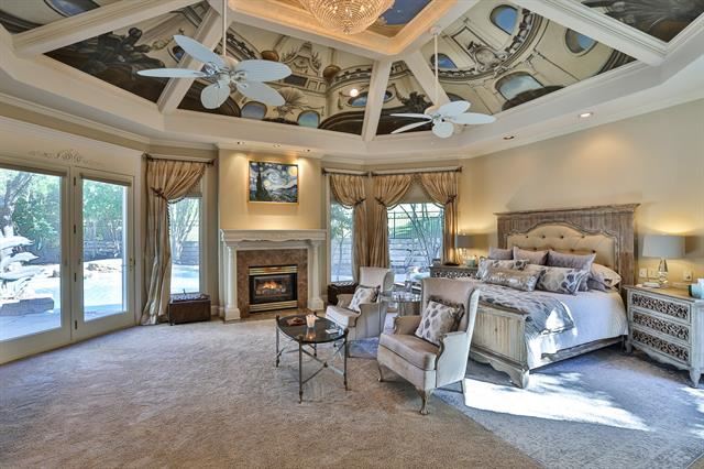 The primary suite at 6805 Laurel Valley Drive brings an octagonal shape and recessed ceiling height.