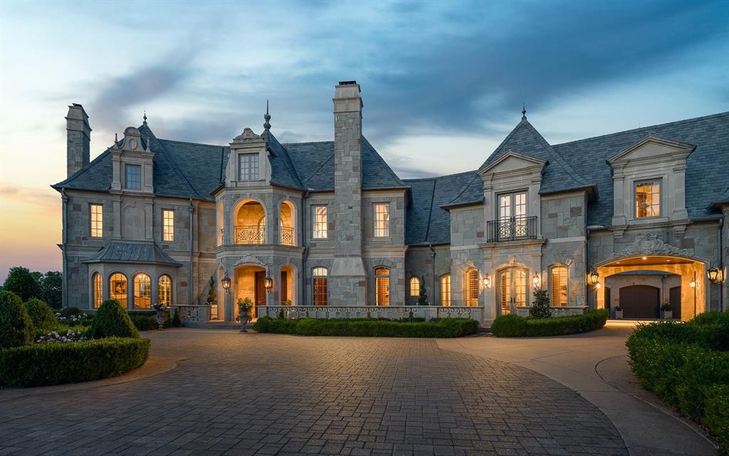 The castle-like exterior and motor court.