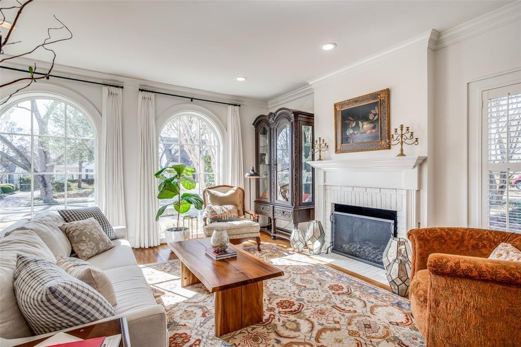 Arched Pella windows flood the front living areas with natural light. 