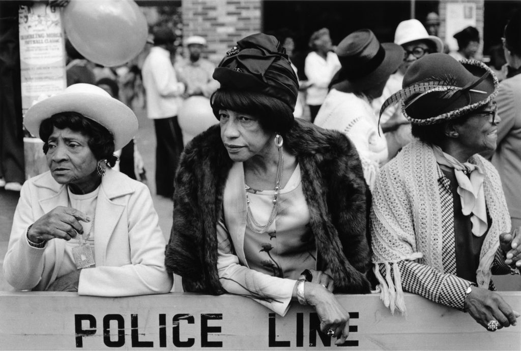 Dawoud Bey's artistic eye captured this image, "Three Women at a Parade, Harlem."