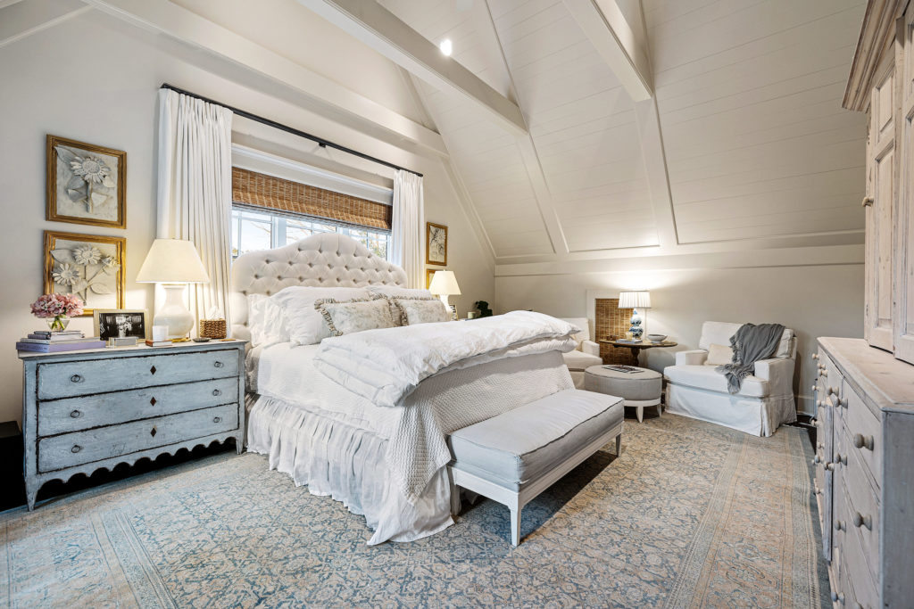 A guest suite in the 1722 River Oaks Boulevard home of Frances and Tony Buzbee. (Photo by Courtesy of Josh Gremillion for Douglas Elliman)