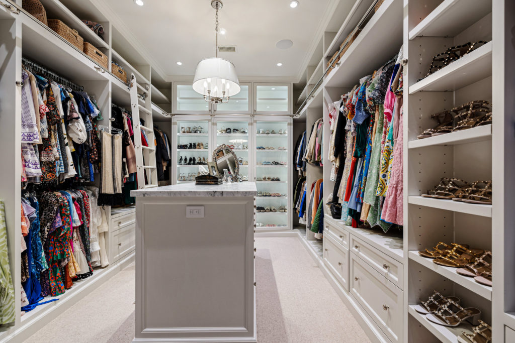 Her closet in the owner's suite in the 1722 River Oaks Boulevard home of Frances and Tony Buzbee. (Photo by Courtesy of Josh Gremillion for Douglas Elliman)