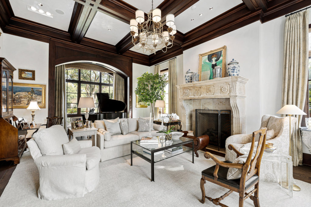 The living room at 1722 River Oaks Boulevard features a 17th century French mantle piece.  (Photo by Courtesy of Josh Gremillion for Douglas Elliman)