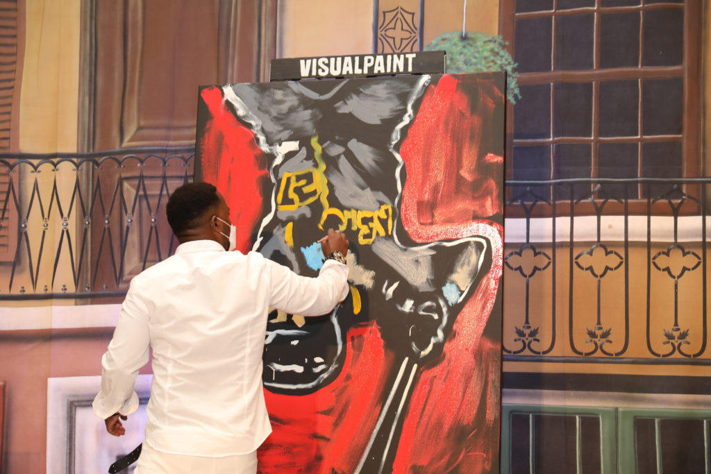 Performance speed painting artist Ange Hillz at the Turn It Gold gala. (Photo by Priscilla Dickson)