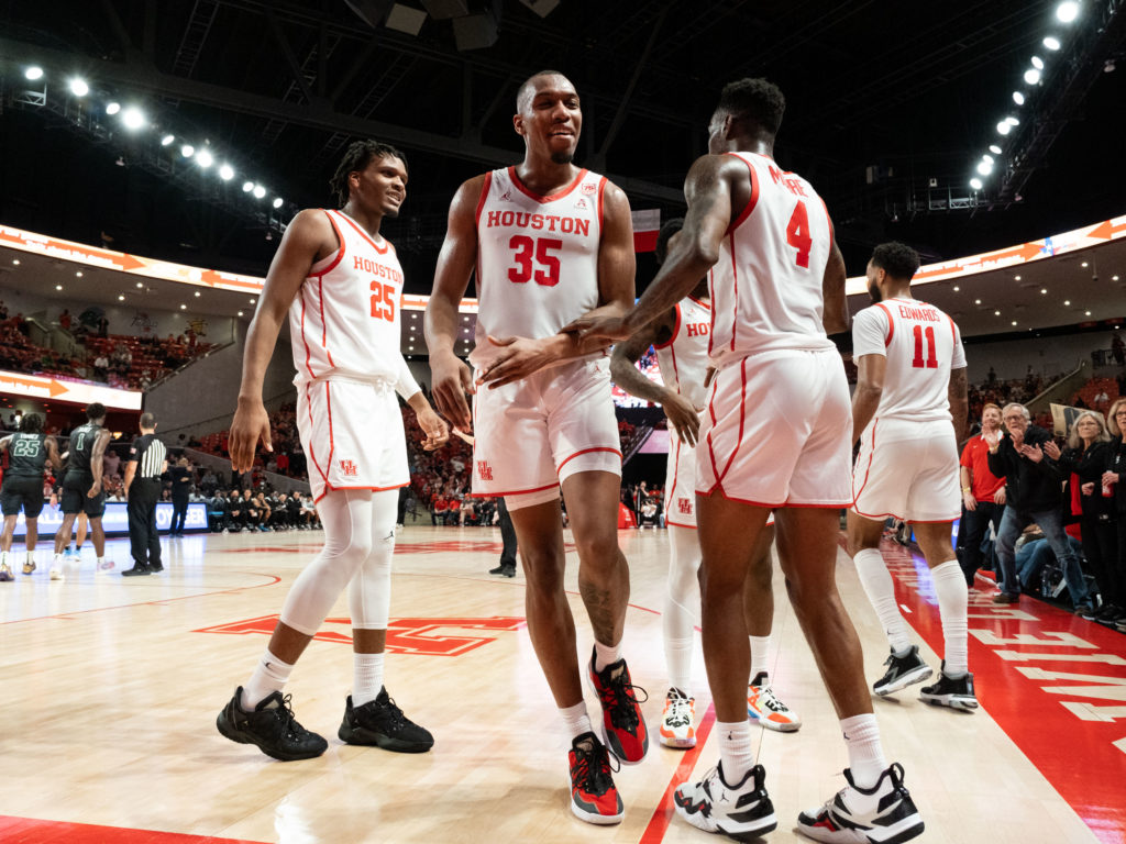 Fabian White Jr., Taze Moore and the rest of the Cougars are having fun. (Photo by F. Carter Smith)