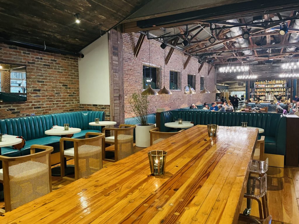 The completely renovated interior at Courtside Kitchen stretches all the way to the bar. Photo by Courtney Dabney.