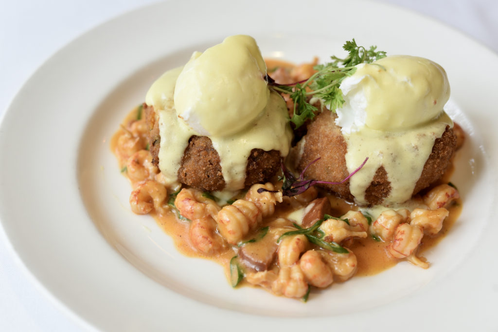 Crawfish cakes topped with poached eggs at Brennan's of Houston (Photo by Kimberly Park)