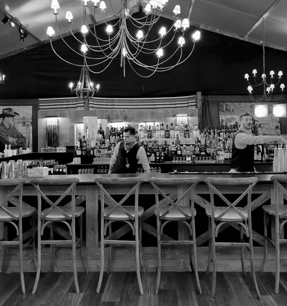 The interior bar of The Ranch Saloon + Steakhouse seats 70 while the outside, covered bar seats 40, no reservations required.  (Photo by Shelby Hodge)