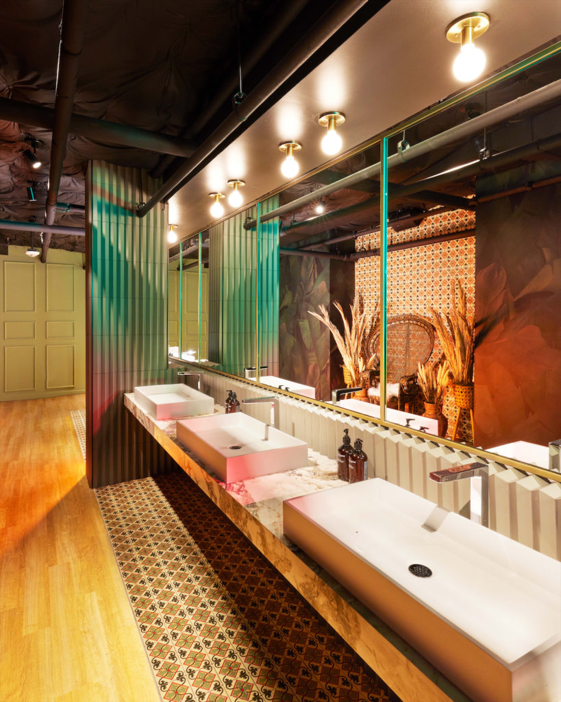 The women's locker room features Dyson hairdryers, Mexican tile, and one great Instagrammable moment.  (Photo by JOHN REED Fitness)
