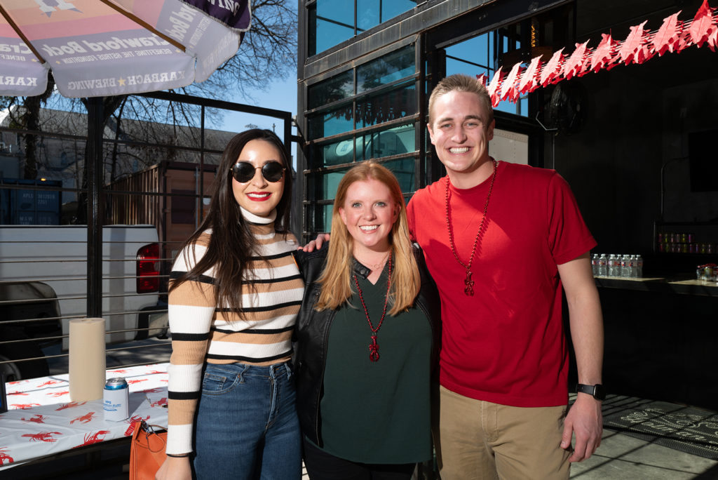 Katja Miller, Rebecca Hoffman, Nate Church at the Crawfish for a Cause fundraiser. (Photo by Daniel Ortiz)