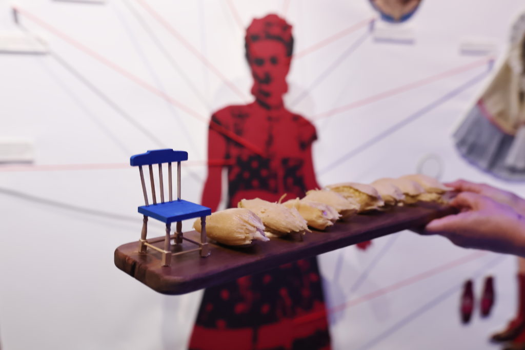 Traditional Mexican fare was passed during the opening of "Immersive Frida Kahlo." (Photo by Quy Tran)