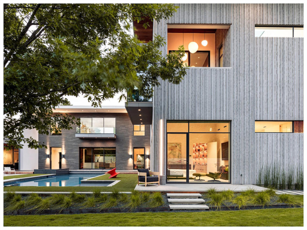A side view of The Taula House backyard, including a 55-foot lap pool. 