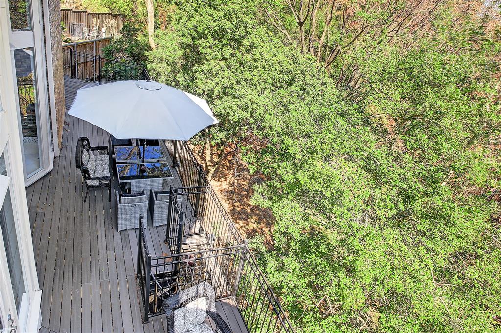 The home features wraparound decking.