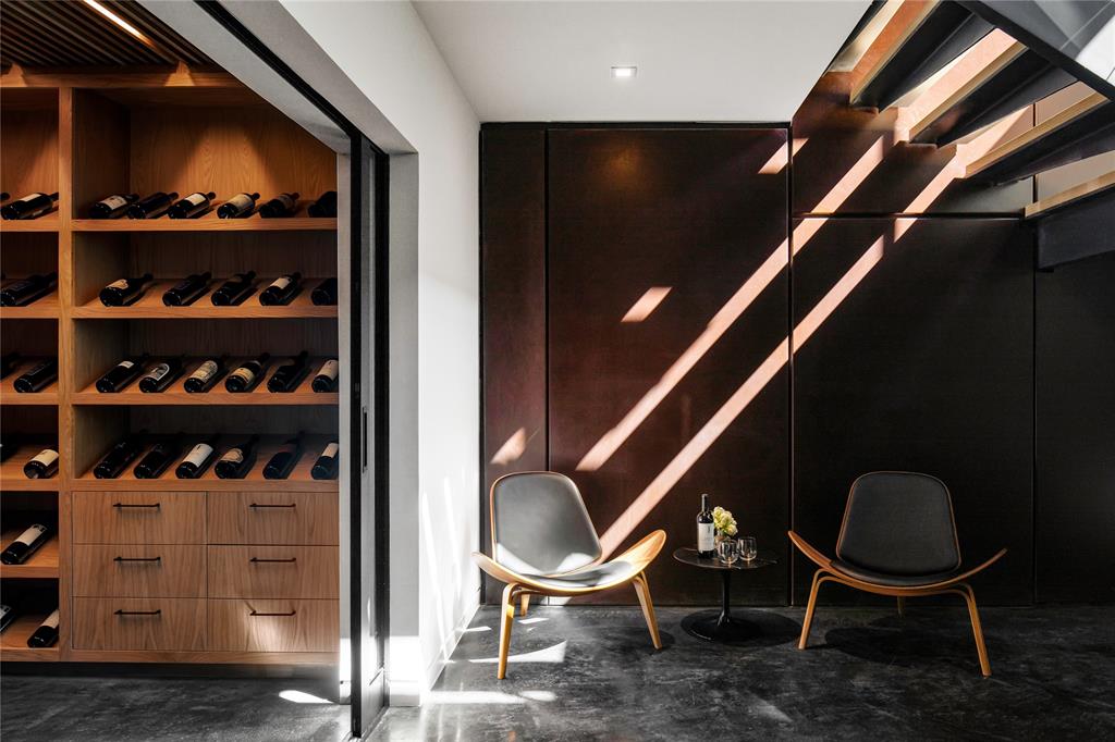 A peak inside the basement wine cellar.  