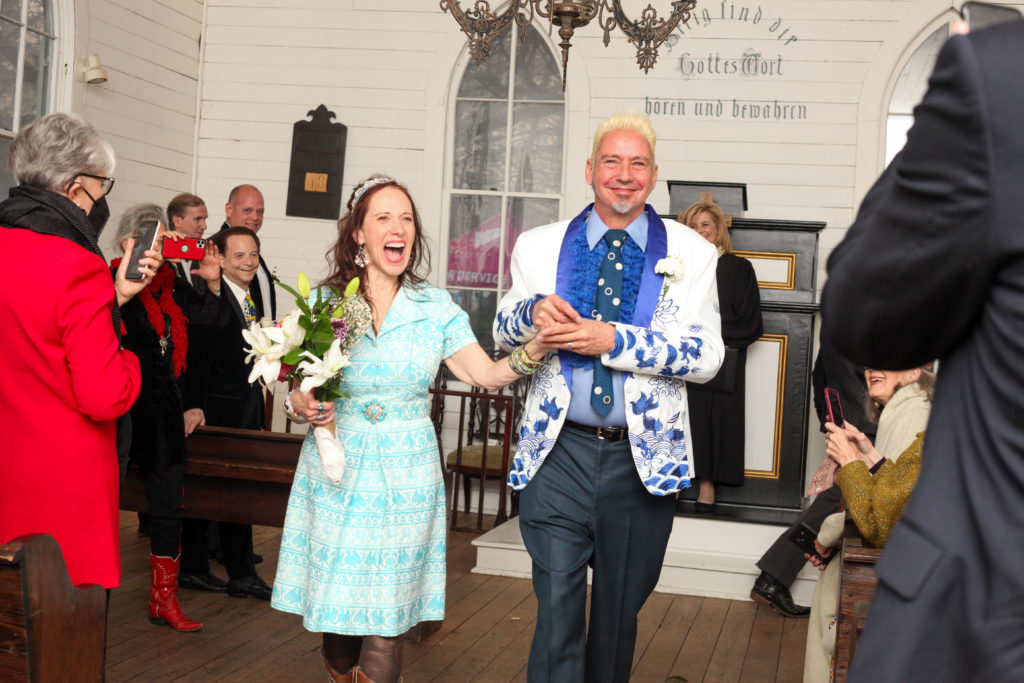 Bride Catherine D. Anspon and groom John Walker joyfully set off from their Heritage Society wedding after saying their vows.