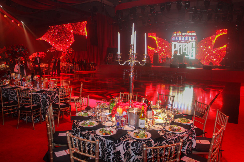 The Events Company transforms the Galveston Convention Center at the San Luis into a Moulin Rouge-inspired setting. (Photo by Gary Fountain)