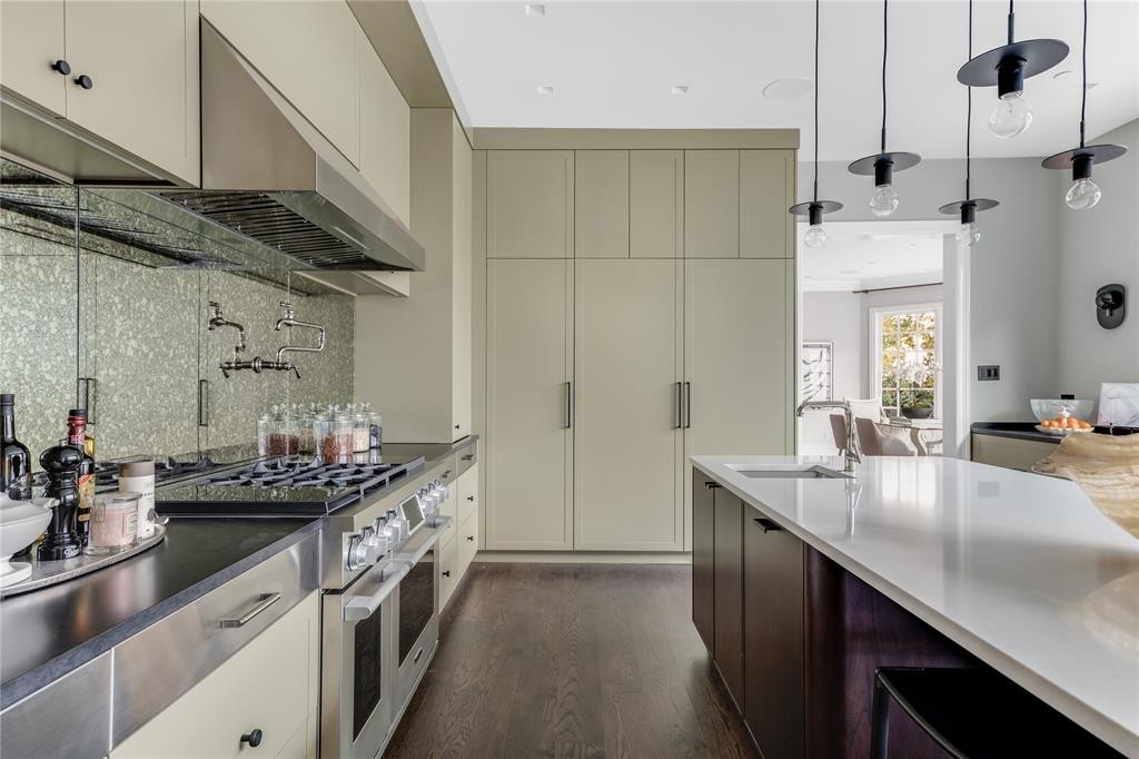 The sun soaked kitchen was designed to have a grounding, enigmatic effect. (Photo by Costa Christ Media)