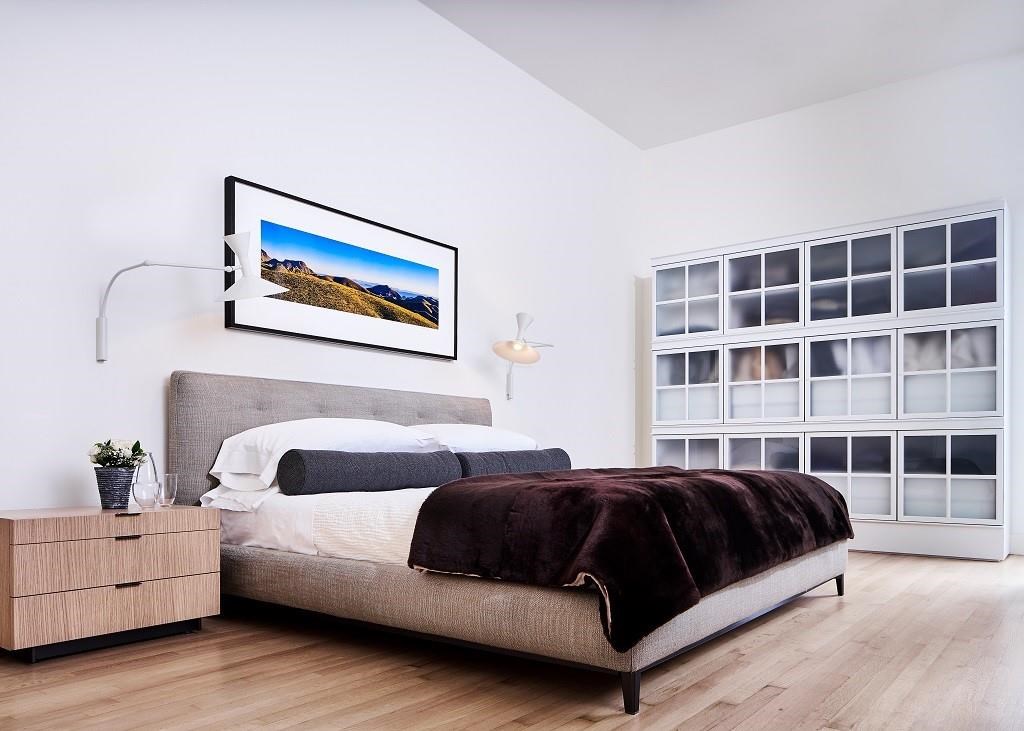 The master bedroom features two closes and a private balcony.