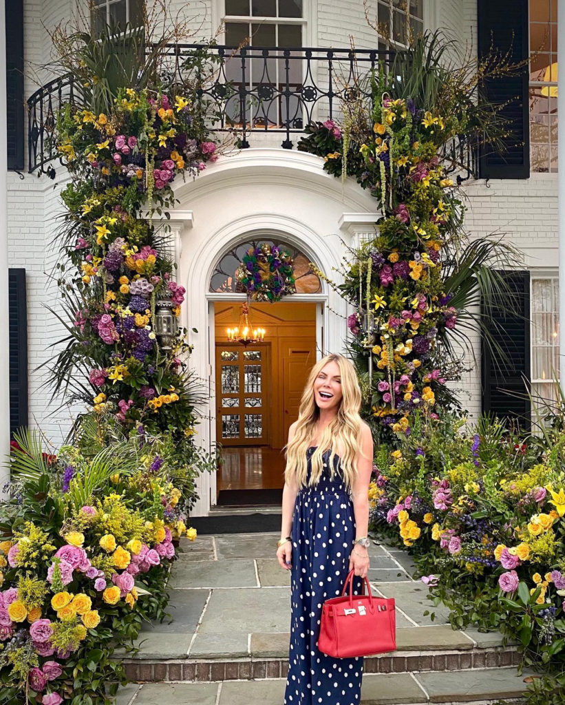 Amanda Mills at the floral entry to the Tootsies' Oscar de la Renta pop-up. (Courtesy photo) (Photo by Daniel Ortiz)