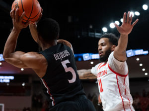 University of Houston Cougars basketball team clinched the American Athletic Conference crown with a win over Cincinnati, 71-53 at the Fertitta Center