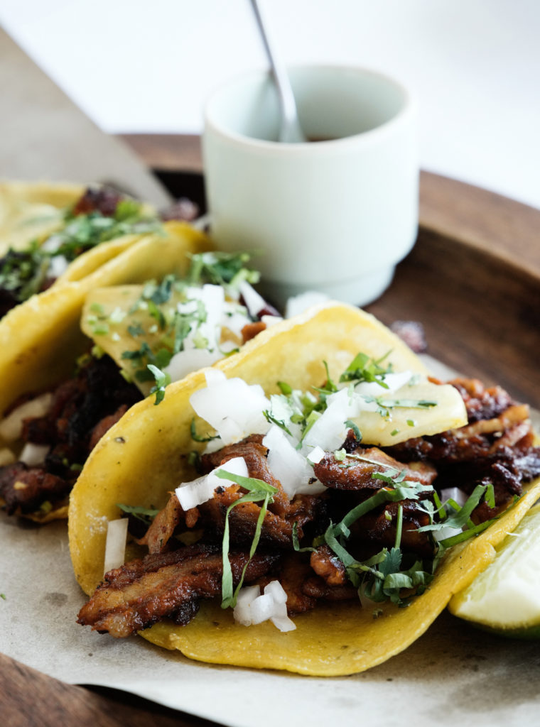 Street Tacos al Pastor stuffed with  thinly sliced pork, pineapple, cilantro, onion and cradled in a corn tortilla. (Photo by Jack Thompson)