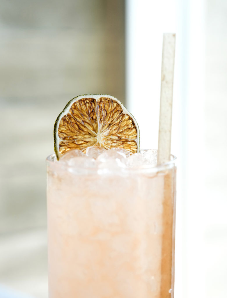 Flora's Piña Colada Fresca is made with coconut fat washed rum, campari, golden pineapple,and  lime juice. (Photo by Jack Thompson)