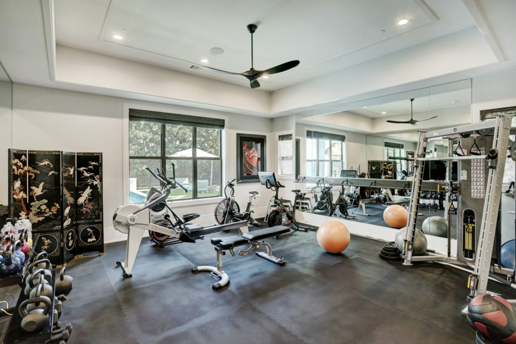 A spacious workout room is one of several resort-like amenities at 802 E. Friar Tuck Lane. (Photo by TK Images)