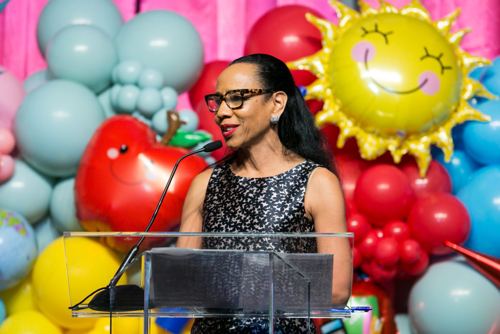 CIS board member Gina Carroll addressing the gathering of 600 at The Post Oak Hotel (Photo by Emily Jaschke)