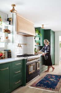 Grace Mitchell – steps into one of her colorful kitchen designs. Photo by Lisa Petrole.