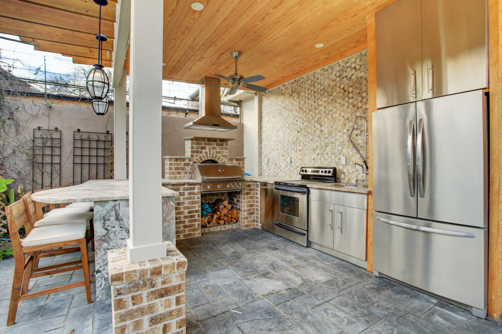 One of several outdoor entertaining areas at 607 Harvard Street in The Heights. (Photo by TK Images)