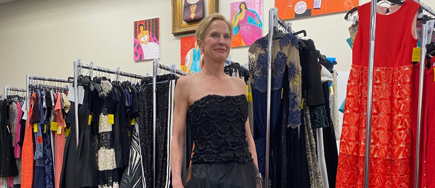 Salvation Army Auxiliary Reflections on Style Chic Boutique co-chair Pam Sengelmann models one of many stunning gowns on sale when doors open on the evening of April 14.