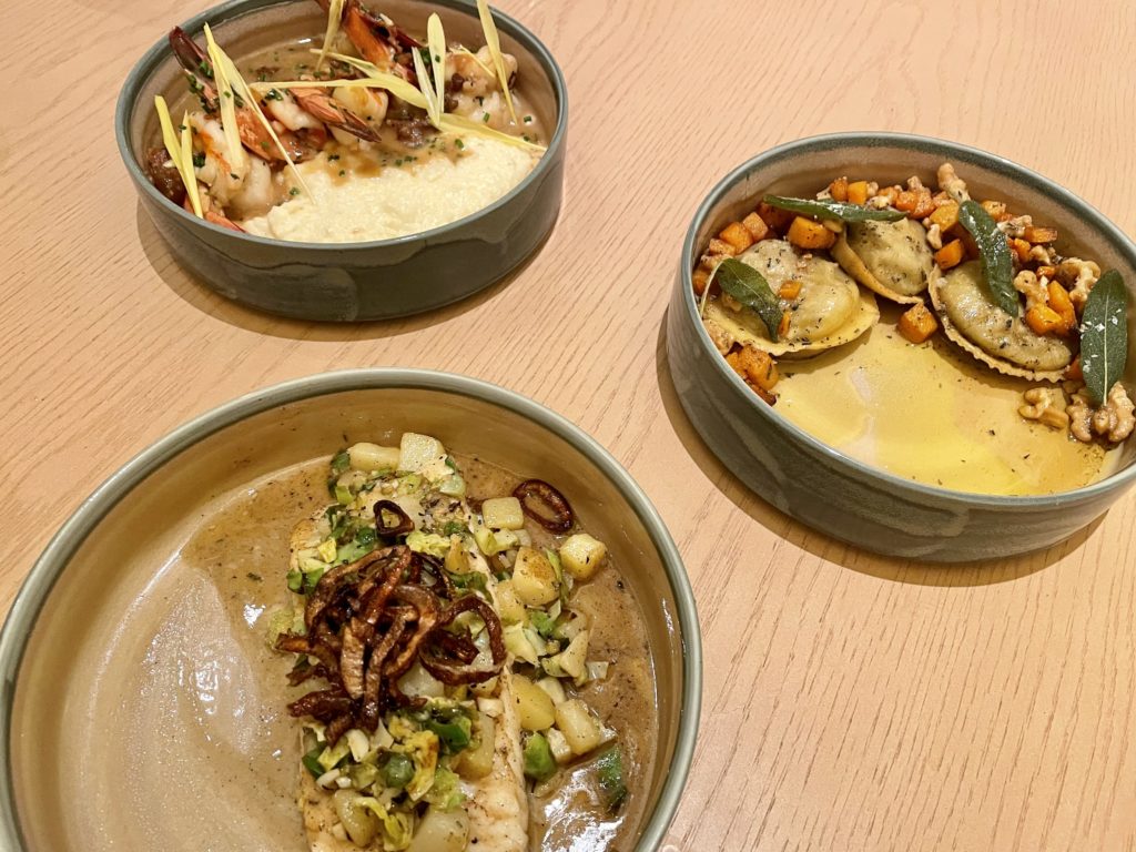 Entrees from shrimp and grits to butternut squash ravioli to pan seared halibut. Photo by Courtney Dabney.