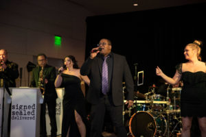 Signed Sealed Delivered performed for the party-ready guests. (Photo by Tamytha Cameron   )