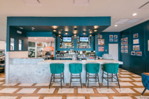 The full-service bar at the Woodway Island Grill makes for a popular Happy Hour spot.