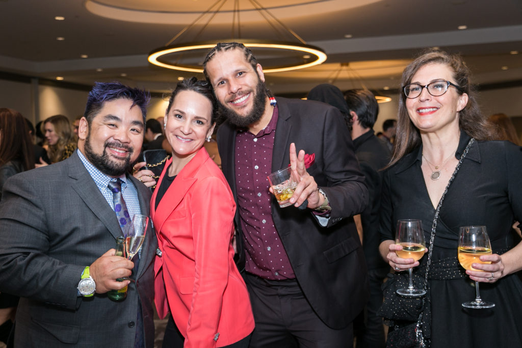 Alvin Schultz, Catherine Manterola, Matt Adams, and judge Katie Stone huddle for a photo at the 2022 Truffle Masters competition. (Photo by Emily Jaschke, zenfolio.com)