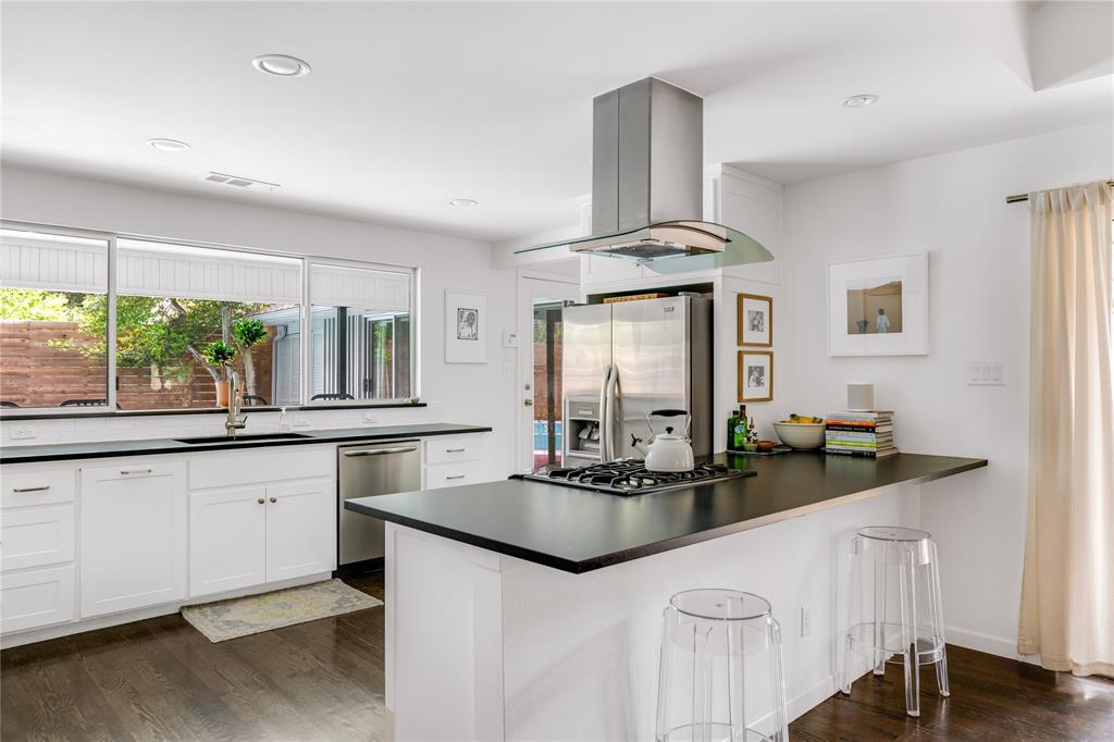 The updated kithcen features high-end, stainless steel appliances. 