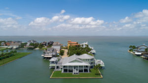 The former Jamaica Beach Yacht Club is transformed into a 5,713 square foot luxury property on the edge of West Galveston Bay (Photo by Sonya Bertolino for Douglas Elliman Realty)