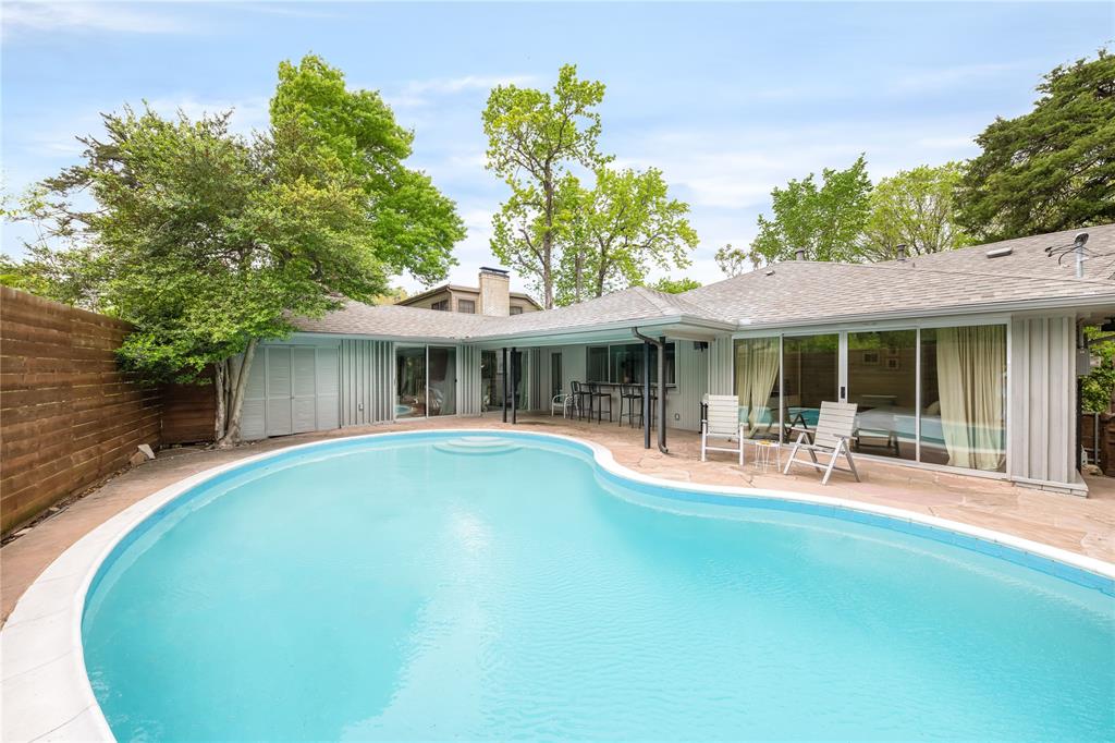 Backyard pool views at 410 Allison Drive in North Oark Cliff. 