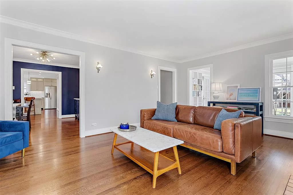 The 1930s Tudor features gleaming hardwoods and freshly painted walls. 